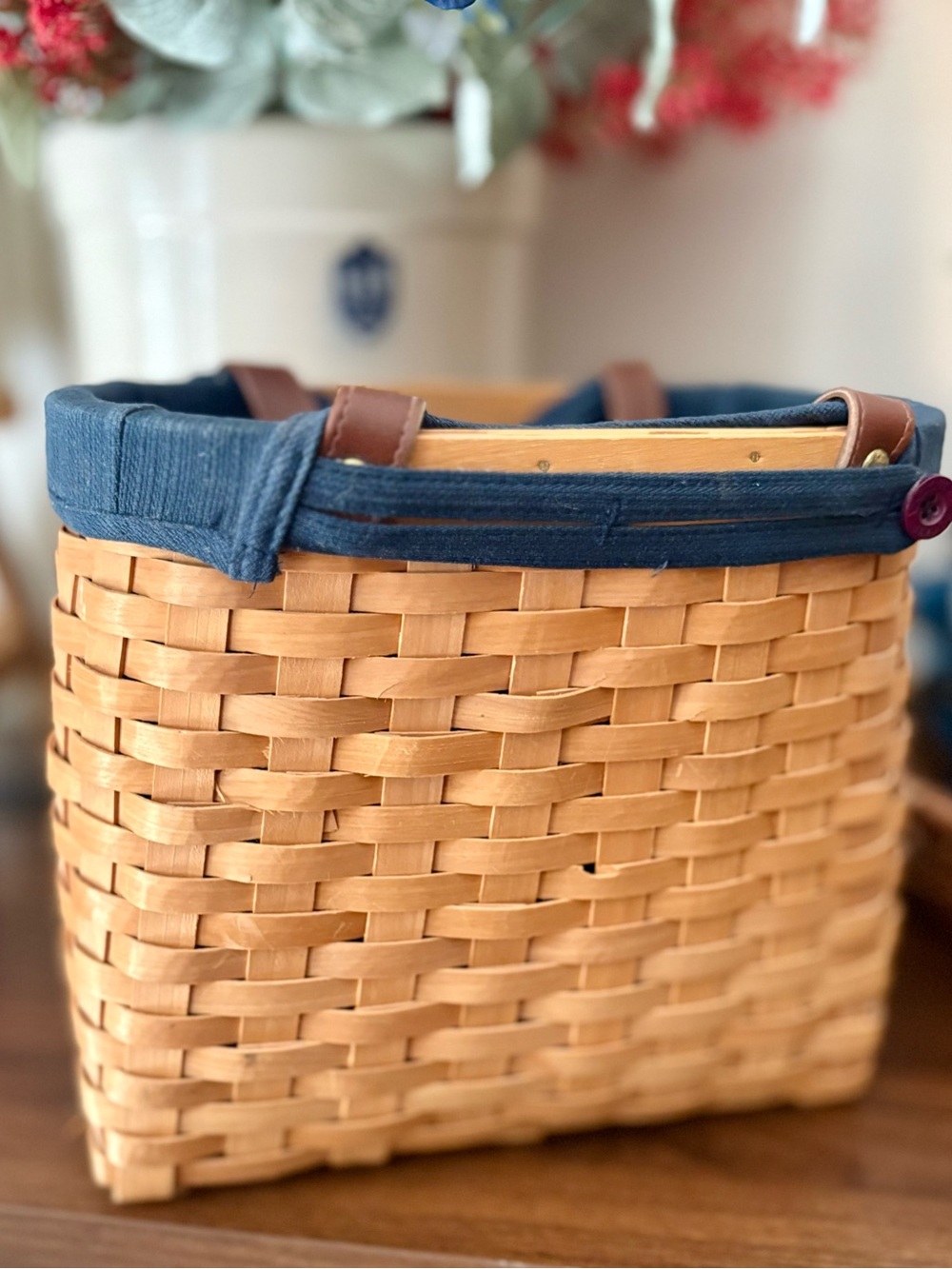 Natural Wicker Basket with Navy Fabric Trim and faux leather handles